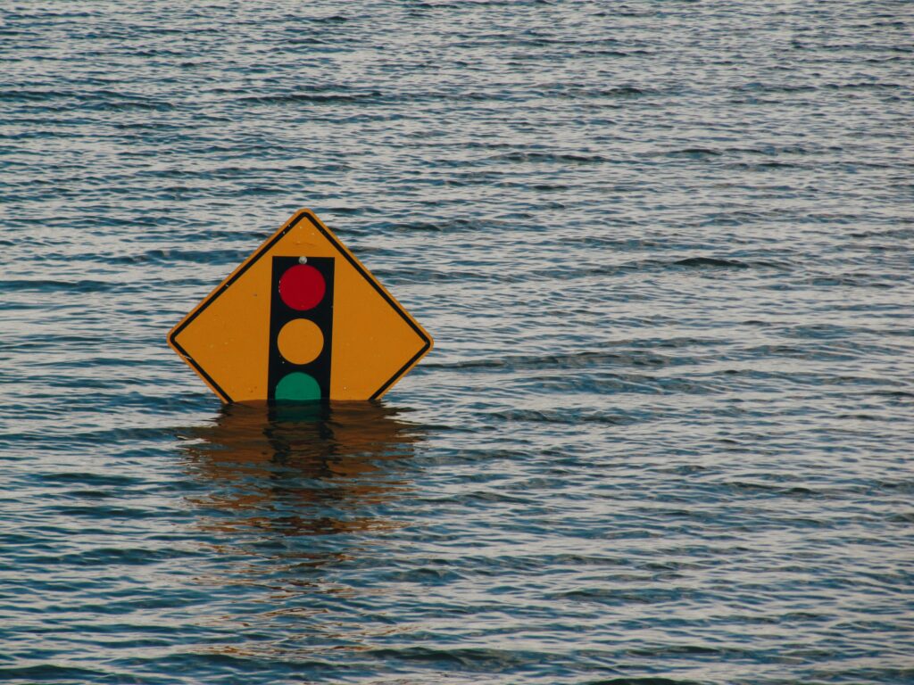 Red light sign bury in water