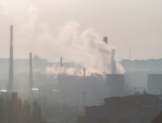 Smog-covered cityscape illustrating urban air pollution